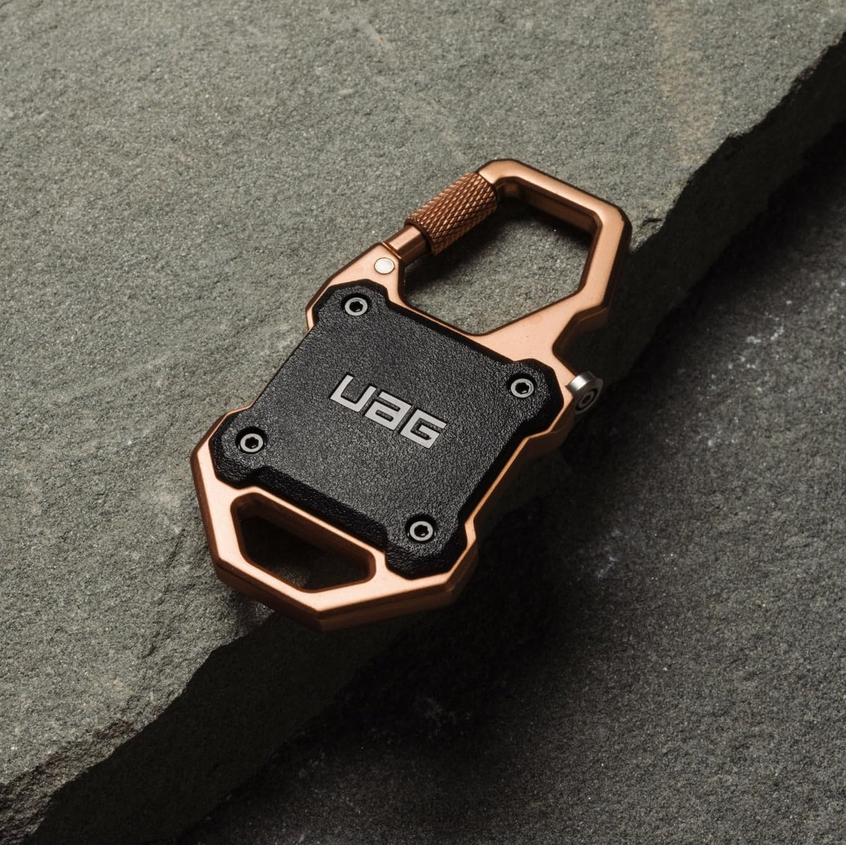 URBAN ARMOR GEAR UAG Designed for AirTag (Gen 2 & 1) Case with Built-in Bottle Opener Monarch - Hard Shell Lock Case AirTag Holder Locking Carabiner for Keys, Luggage & Bags, Black/Copper